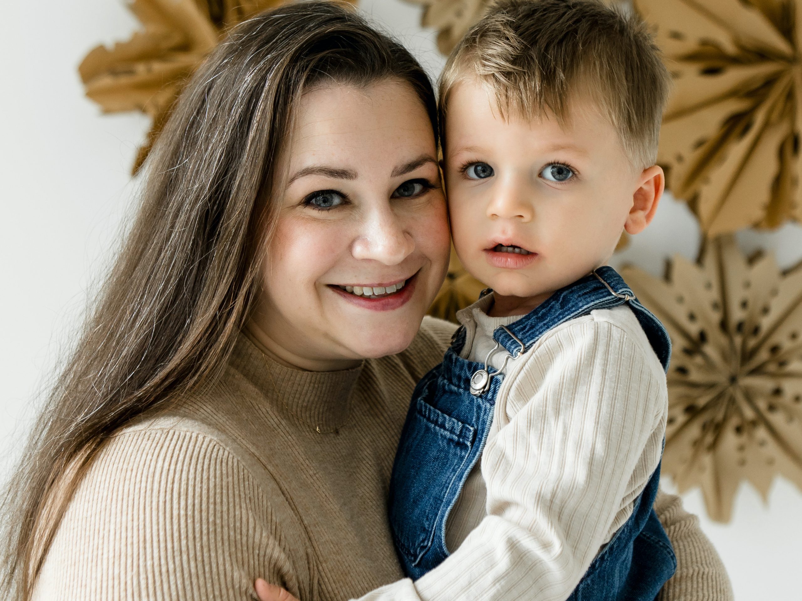 Becky Chamberlain holding her son
