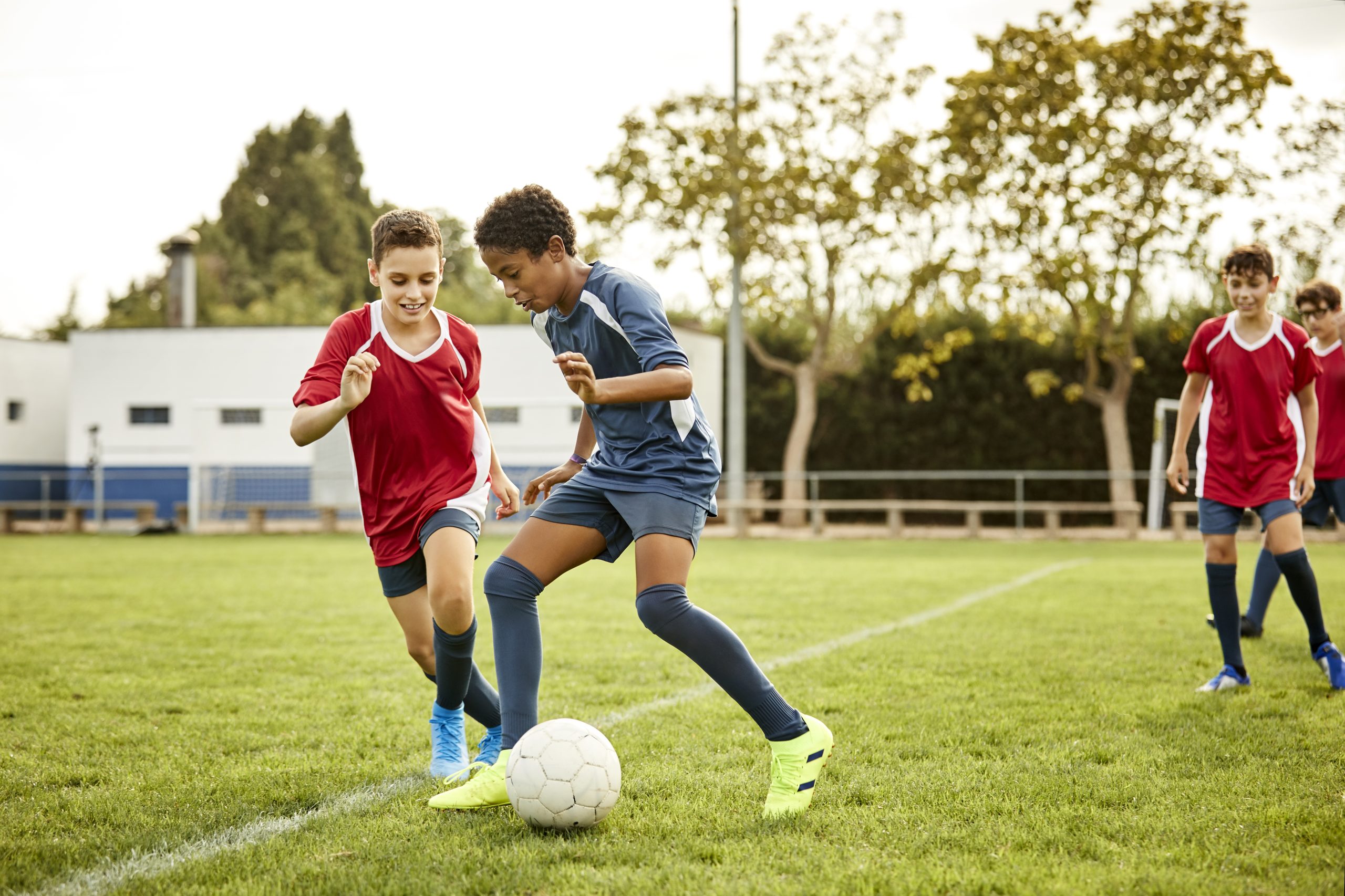 two boys playing football